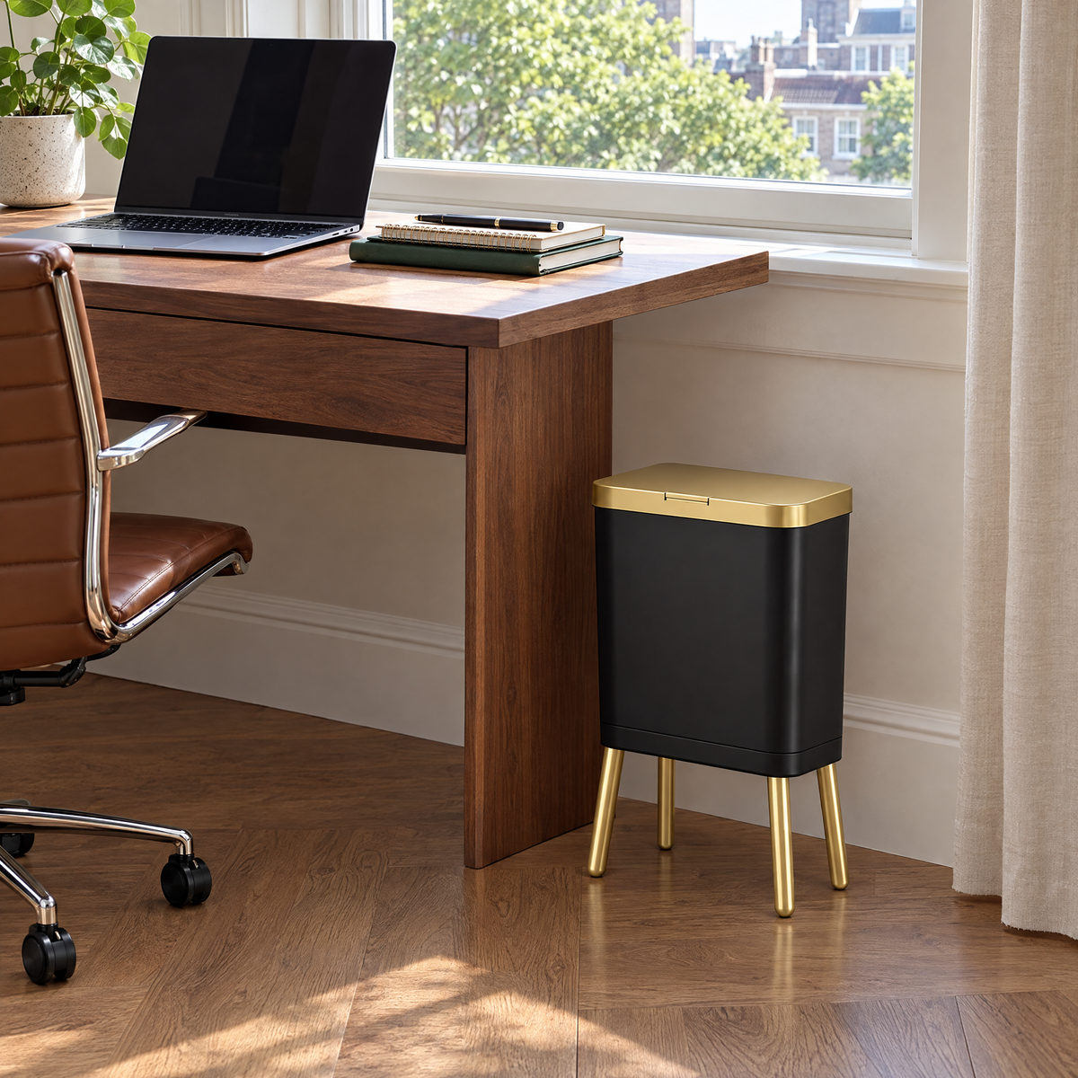 Black Alto waste bin beside a walnut desk in a home office