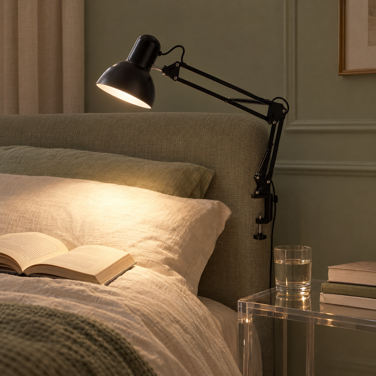 Braccio clip lamp reading light over a bed