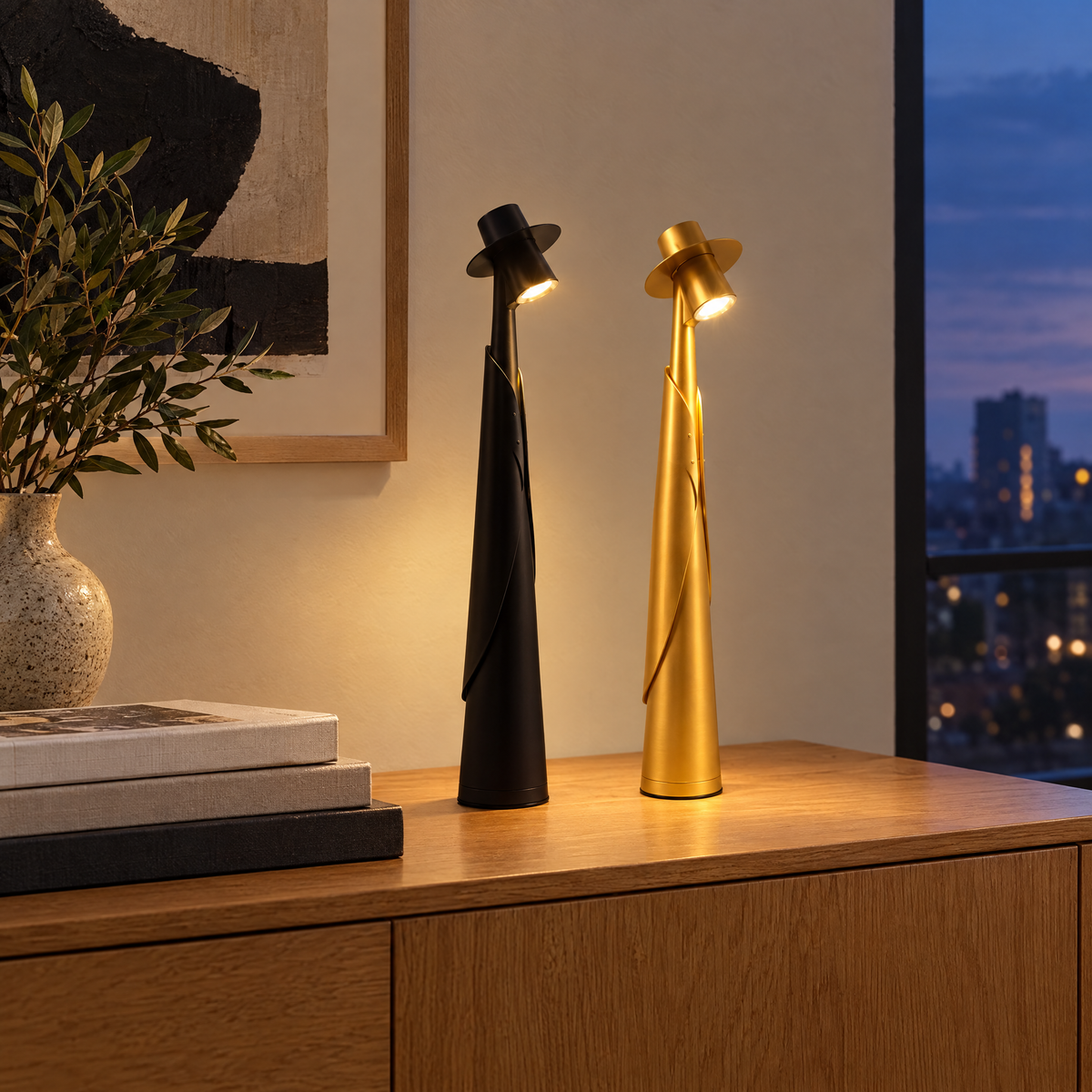 Black and gold Cappello lamps on an oak sideboard