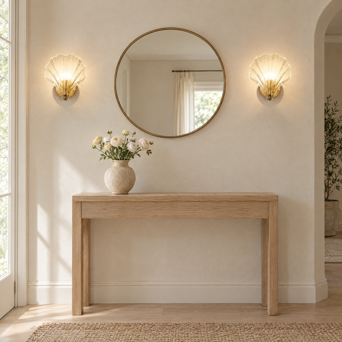 Conca Shell Glass Wall Light a pair flanking a round mirror in an entry