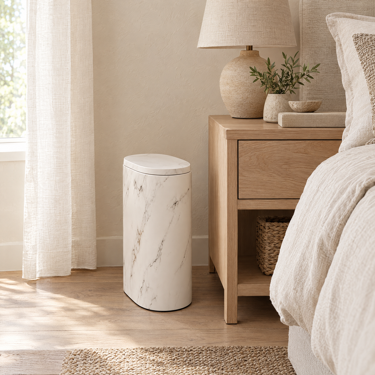 Cream Pulito bin beside an oak nightstand in a bedroom