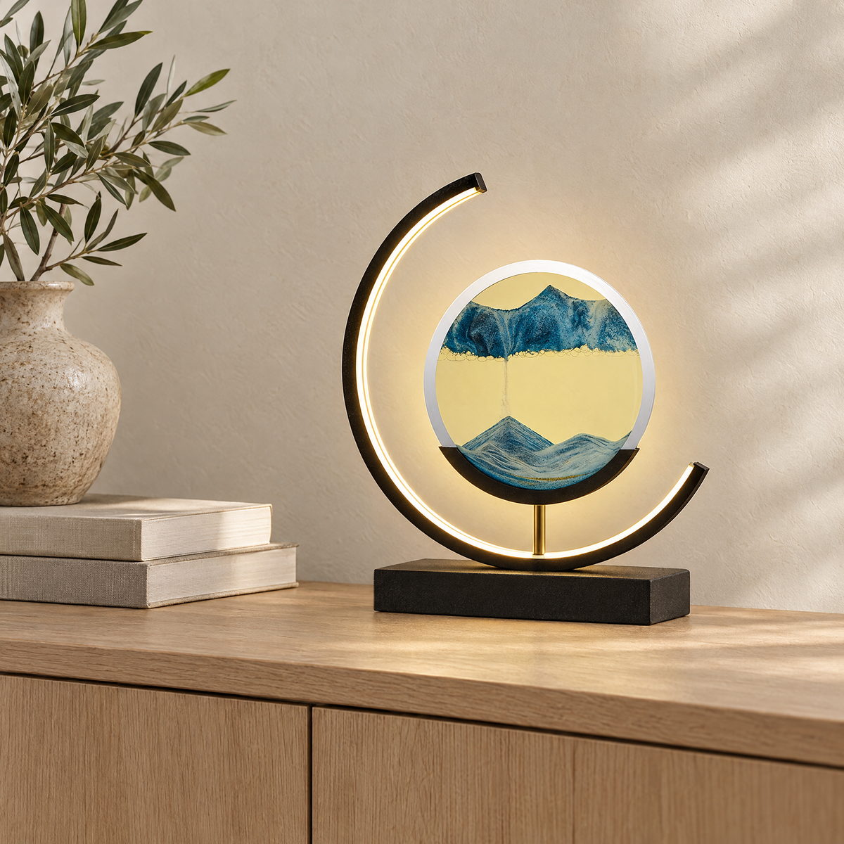 Duna sand lamp with blue sand on an oak sideboard