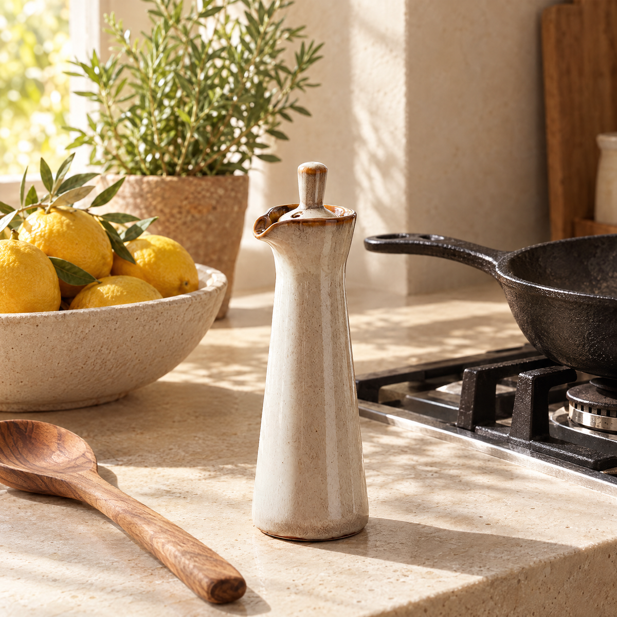 Ampolla oil dispenser beside a stove