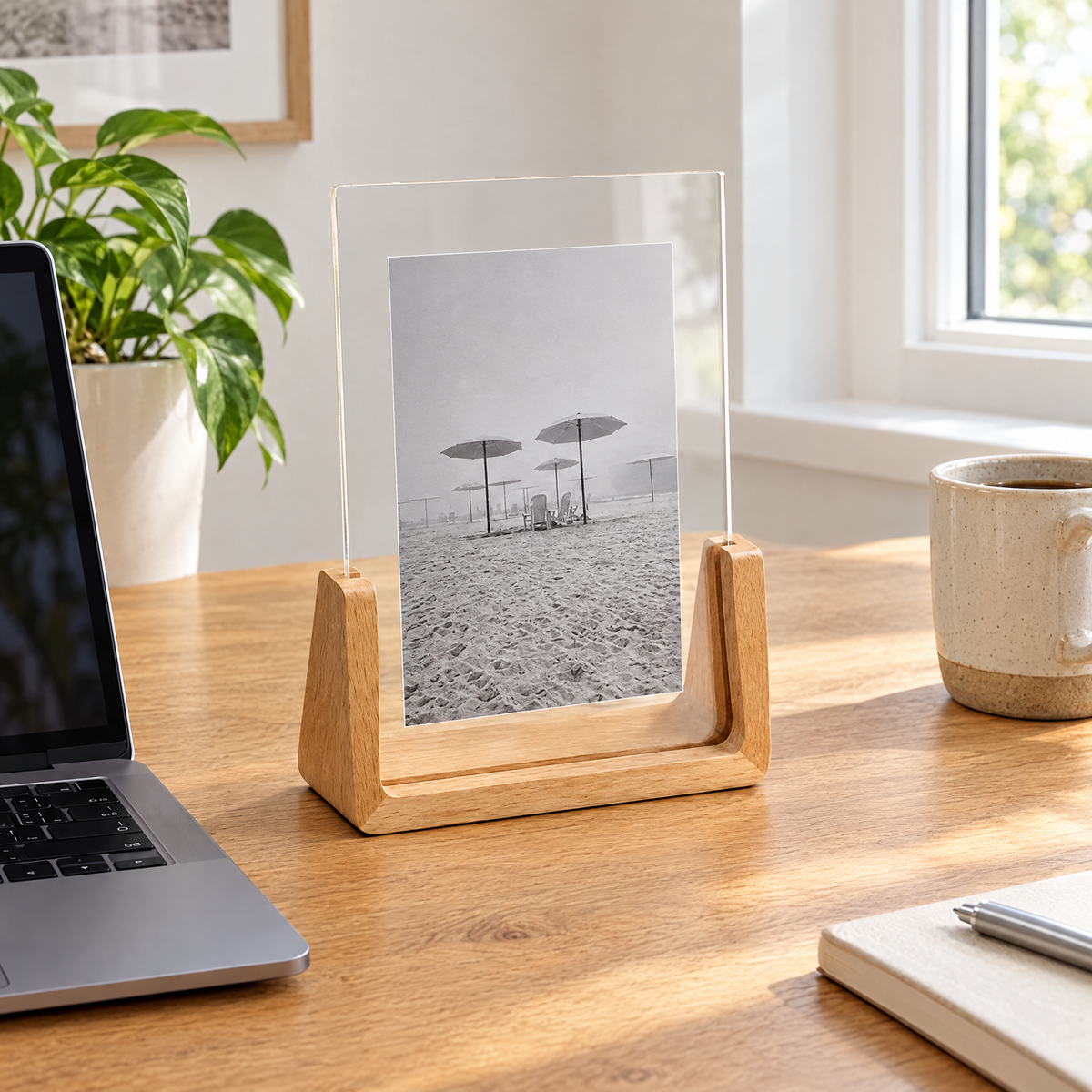 Portrait Chiaro acrylic photo frame on an oak desk