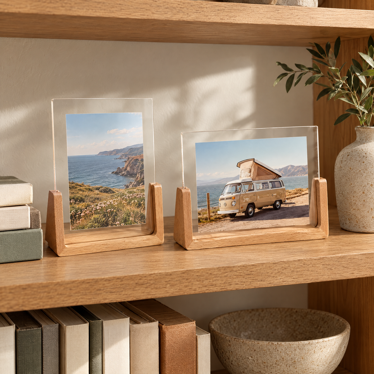 Two Chiaro frames on an oak bookshelf