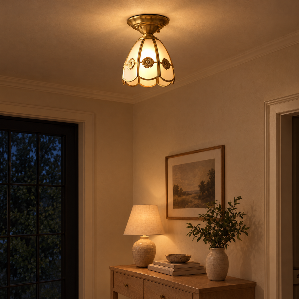 Fiora Brass and Glass Semi-Flush Ceiling Light in the Bell style glowing in a hallway in the evening