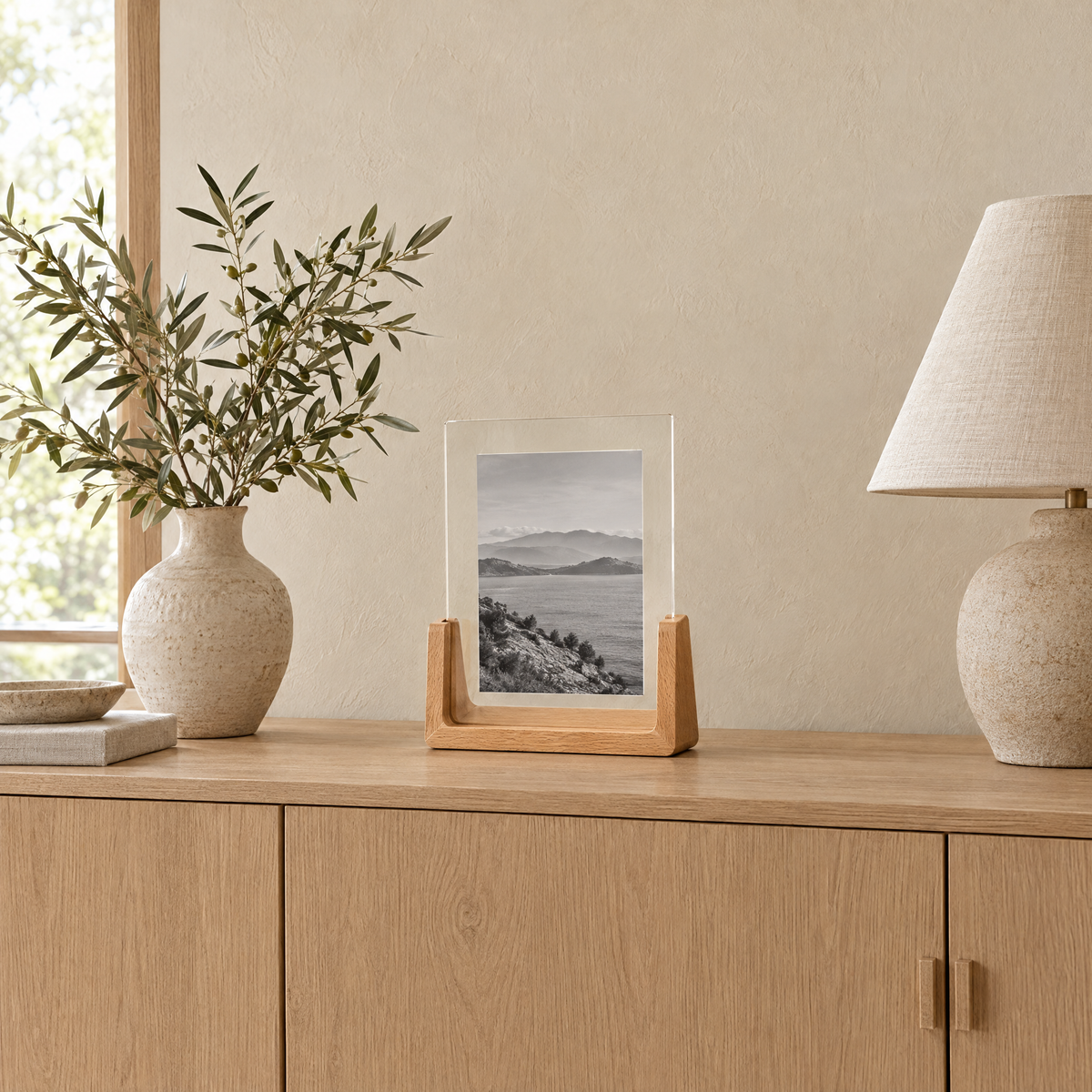Portrait Chiaro frame on an oak sideboard in a living room