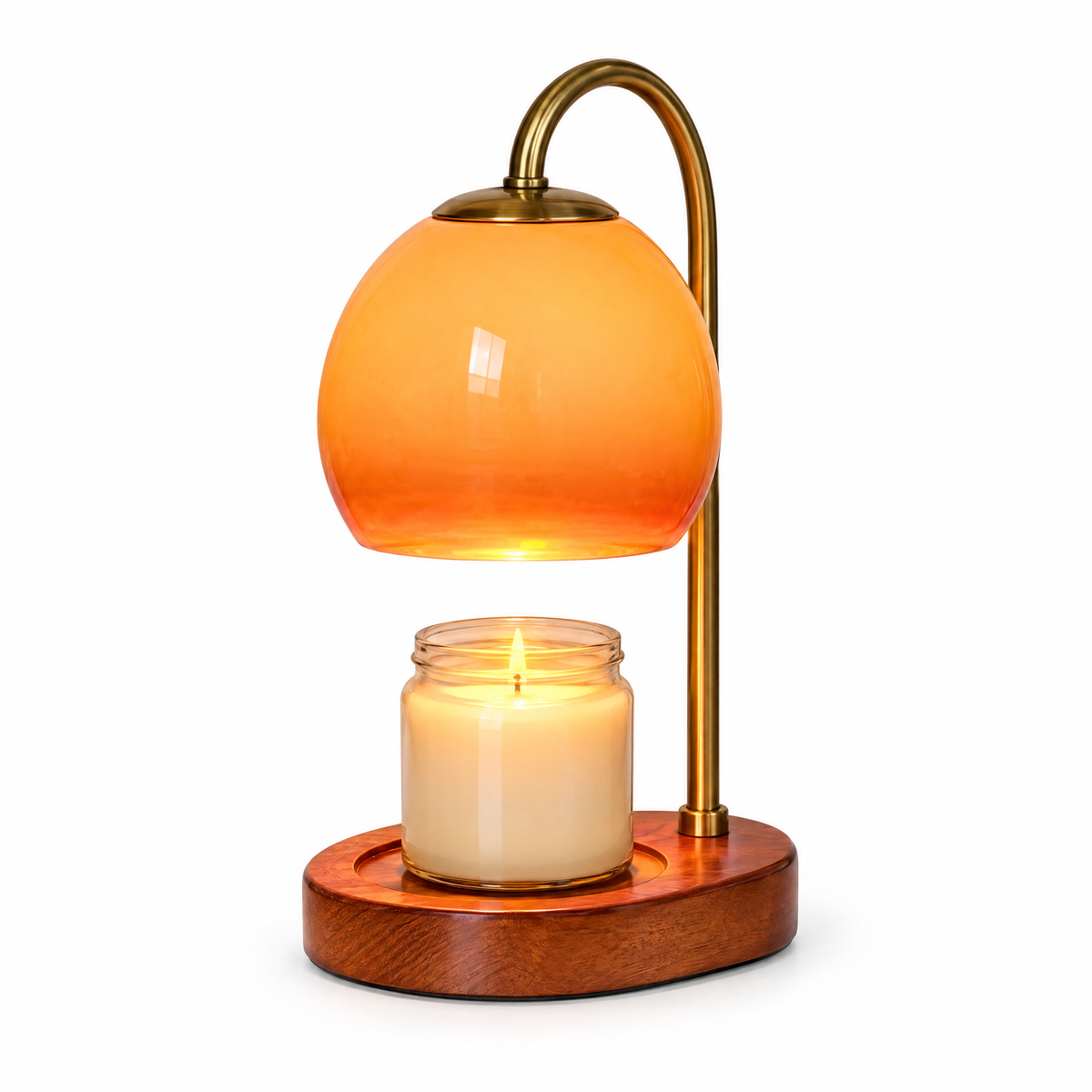 Cera candle warmer lamp with orange glass shade on a white background