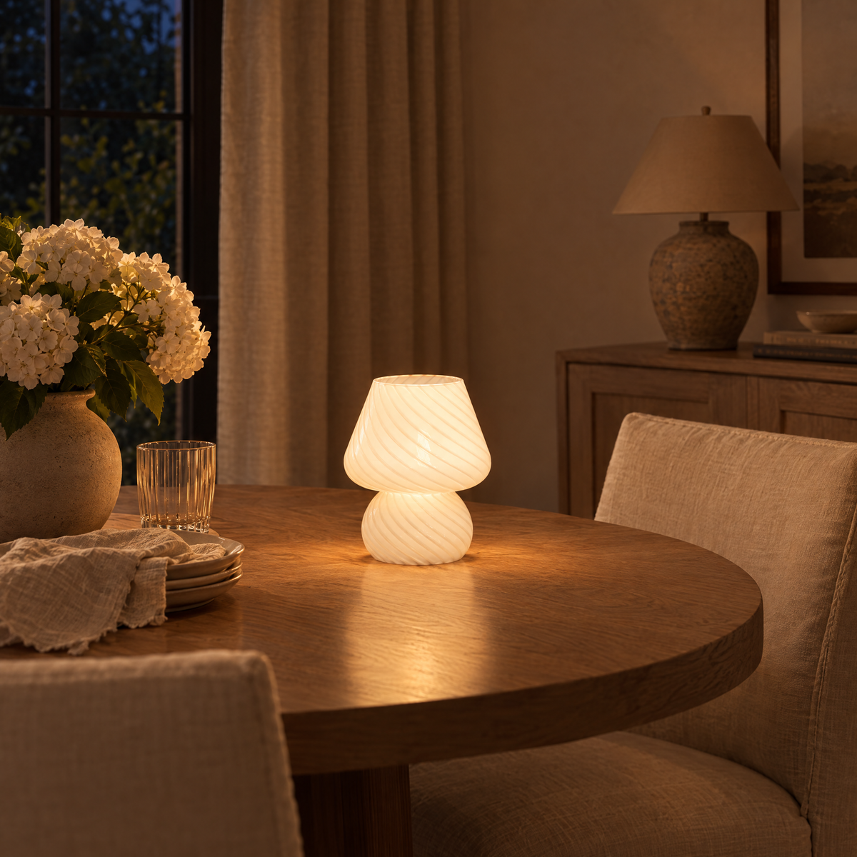 Vortice Swirled Glass Mushroom Lamp in a warm evening setting